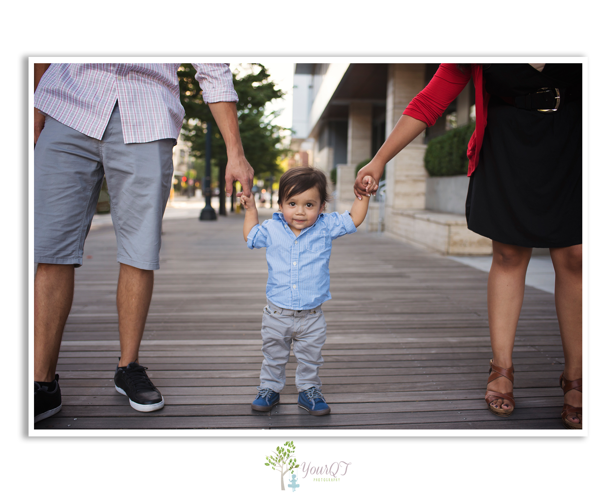 Inman Family City Session Downtown Portland Oregon Son holding Mom and Dad's hands